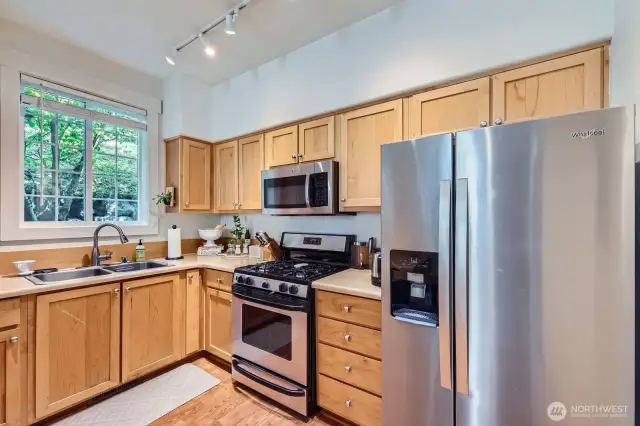 Natural wood cabinetry brings organic style, calm & warmth to your home.