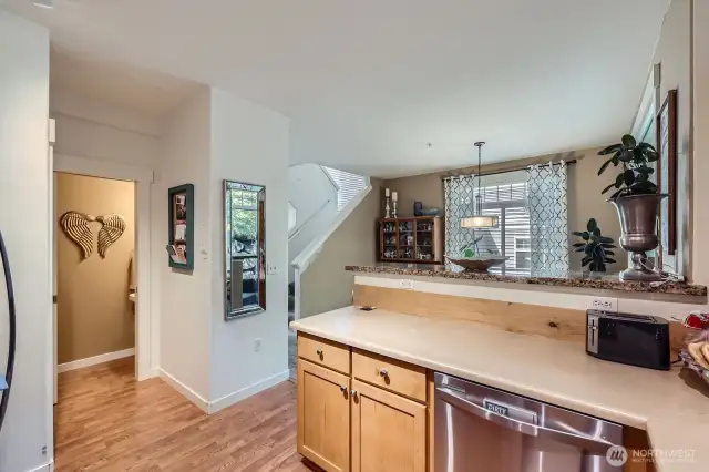 Granite top ledge on upper counter as added accent.