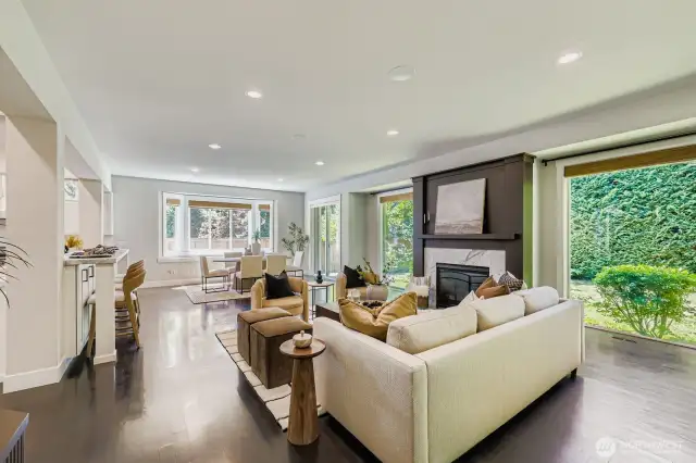 Great Room With Fireplace and Walls of Windows