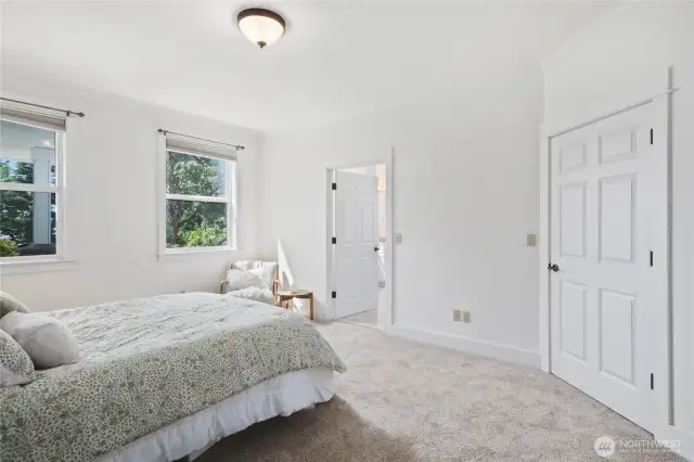 Large primary bedroom suite on the main level.