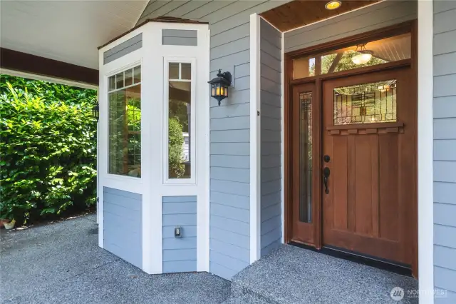 Covered back porch and patio area.