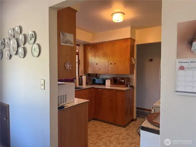 Kitchen leads to dining room