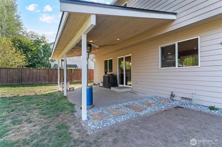 Covered patio and fresh stone landscaping