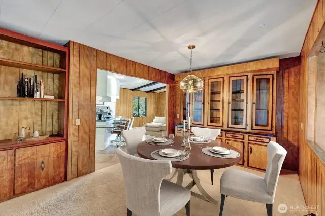 Formal dining room has built in hutch for all your dining necessities, linens, silverware, china or? Space will easily accommodate a 6-8 seating table. Stepf from the kitchen for your convenience.