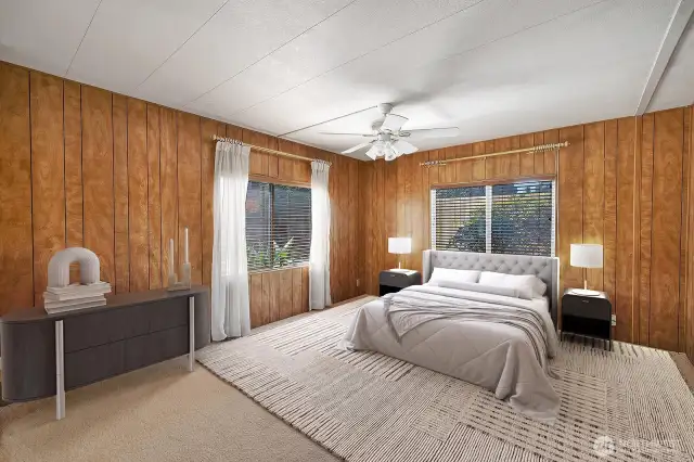 Primary ensuite is the full length of the back of this home. Room for King size bed and additional furniture. Walk in closet with shelving for all his and her clothes, shoes etc. Ceiling fan for your comfort. Plenty of natural light from the large , vinyl windows.