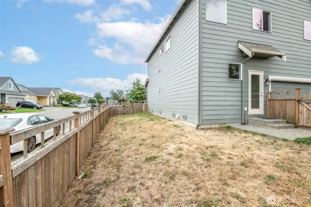 Side View Of Fully Fenced Backyard