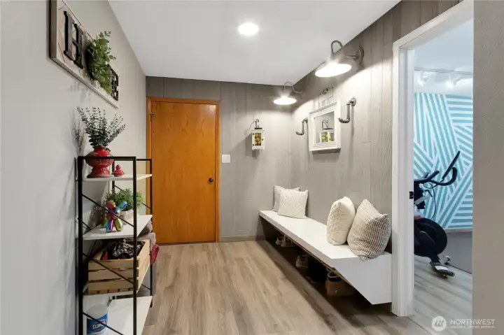 Basement floor mudroom off Attached 2-car Garage.