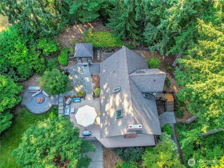 Your Pacific Northwest Retreat comes with a Back patio for entertaining, Full Fireplace area, Gazebo (pre-wired for a hot tub), Game area on the backside of the house and a nature trail!