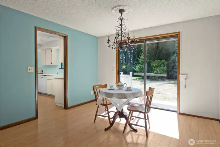 The glass slider leads to the sun drenched porch, it also has the "roll down shutter".