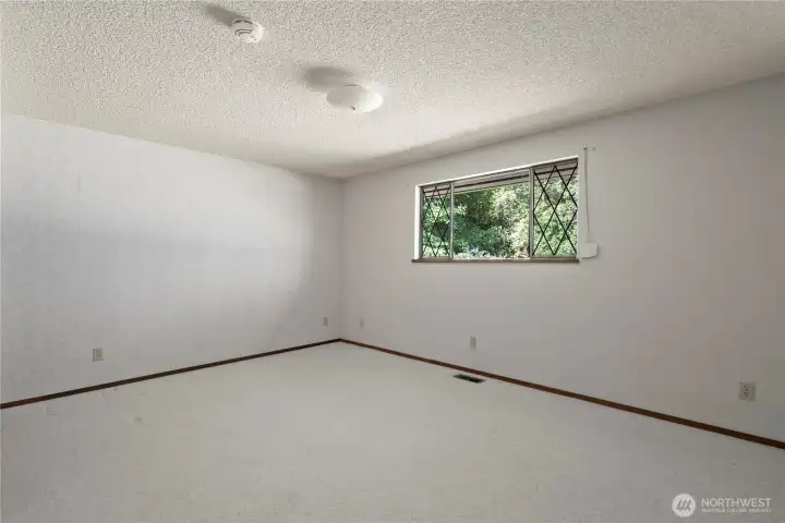 Bedroom two with large closet. windows all have roll down shutters for blocking out light if desired or closing up the house. See virtual tour link for 3D walkthrough video, interactive floor plans and more.