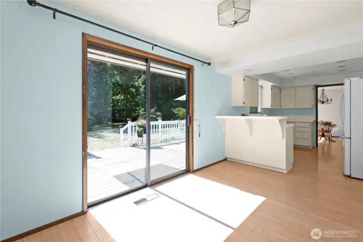 The breakfast nook with large slider to the back deck. Perfect for entertaining!