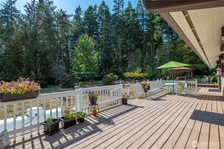 This lovely sunny deck adds so much room for gardening and enjoying the beautiful surroundings!