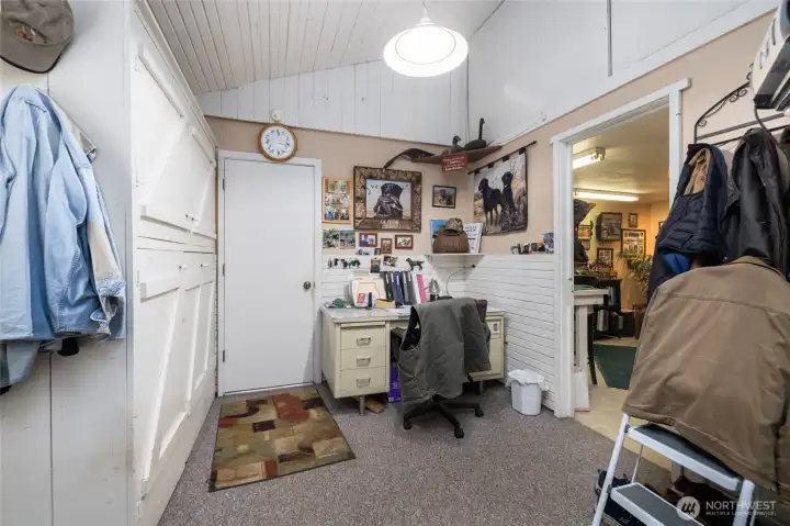 The "breezeway" mudroom area that connects the house to the garage.  This area is completely enclosed, offers additional storage, and an extra finished room for hobbies or home office.