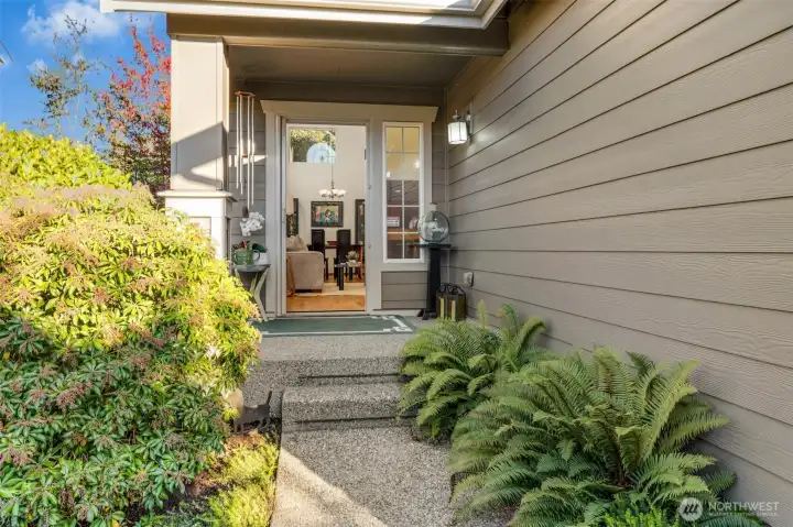 A beautifully landscaped path invites you in