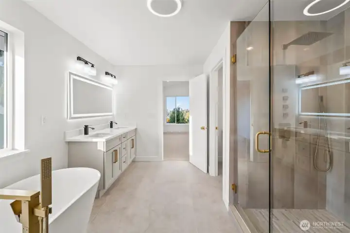 Primary bath showing the waterfall shower at right