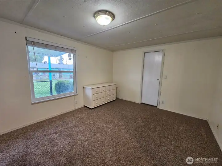 Massive walk in closet/home office behind door on right