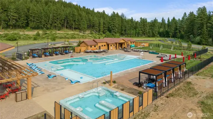 Suncadia Rec Center with indoor and outdoor pool, hottub, workout room, store for shopping and water slides. This pool open year round
