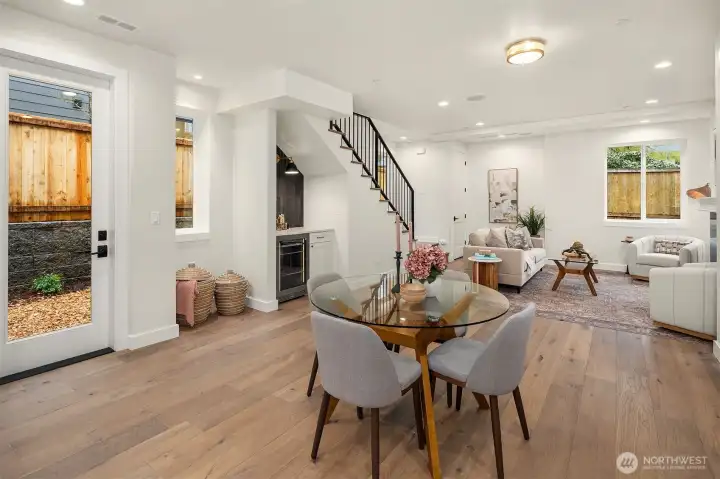 Back door off kitchen and main floor 1/2 bath takes you to large fully fenced yard.