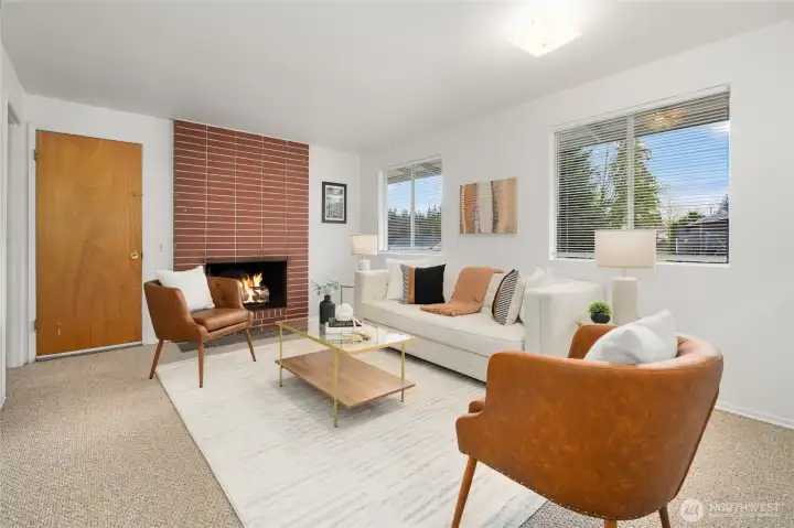 Living room opens to kitchen. Door goes to the bonus room and storage/laundry room.