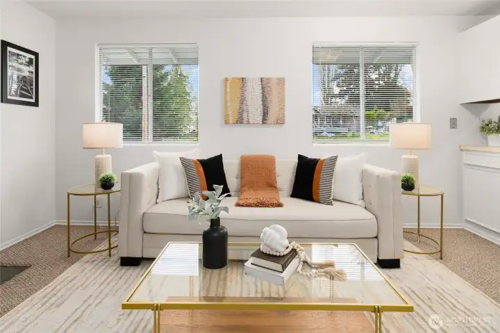 Living room with large windows and new blinds!
