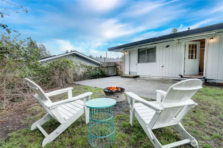 Large patio and firepit area.