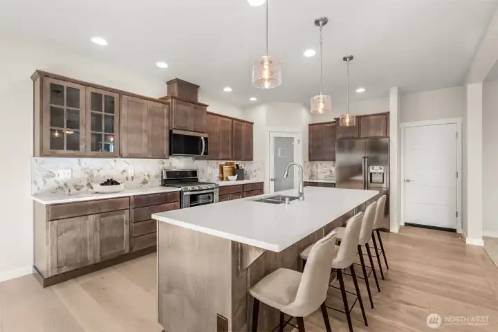 Graphite Maple shaker soft close cabinetry.