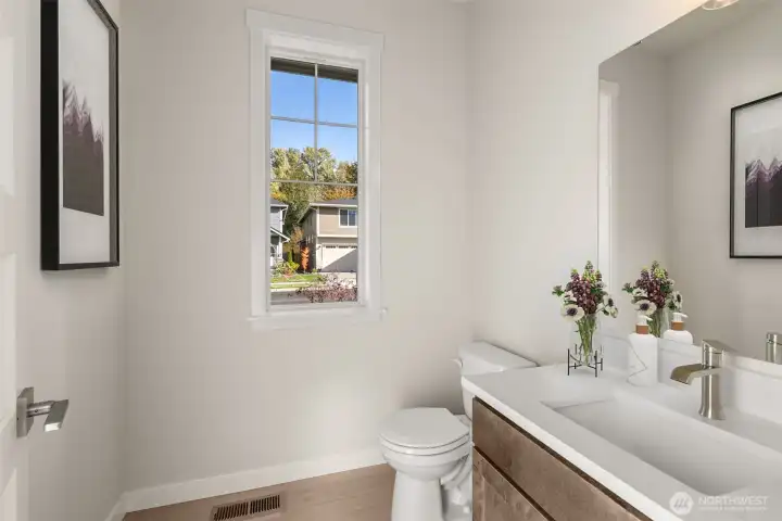 Downstairs powder bath with quartz.