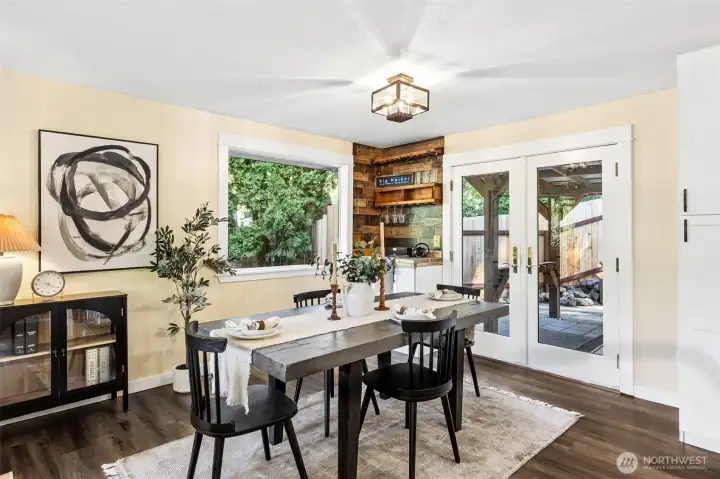 Easy access through the french doors to the back patio and yard.