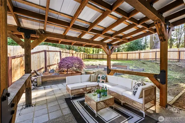 Back patio is covered, making for easy entertaining rain or shine.