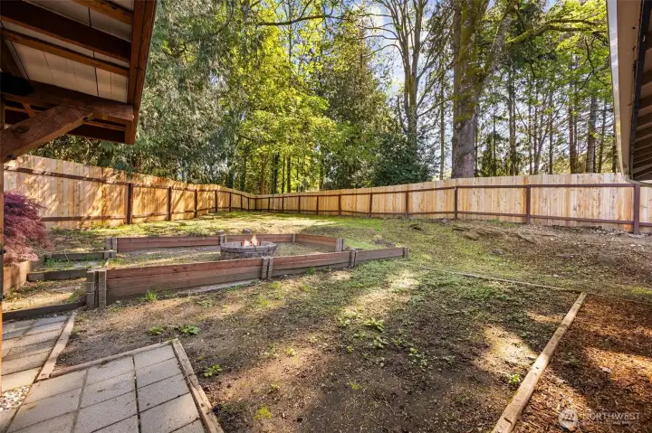 Fire pit perfect for gatherings, roasting marshmallows on summer evenings.