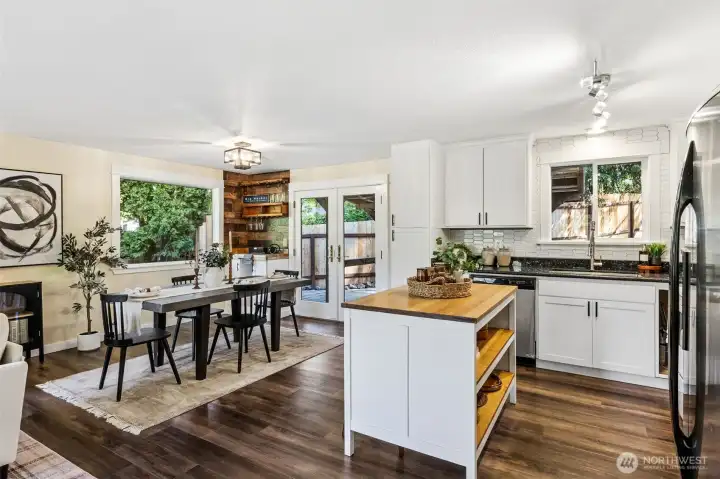 A different view of the kitchen and dining area.