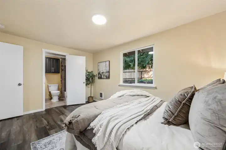 Primary bedroom with its own door to the bathroom.