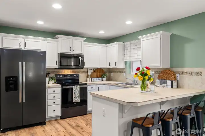 New fridge, oven and microwave stay with new owners