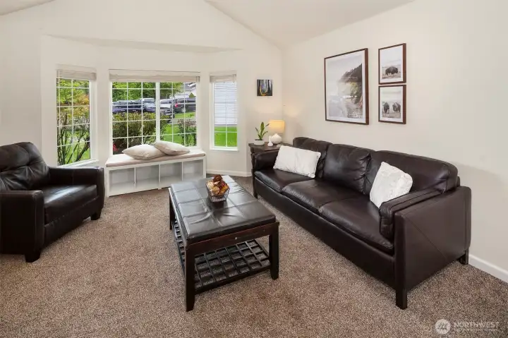 Living room windows with views of front yard.