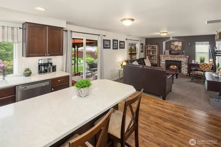 Kitchen with view into second living area.