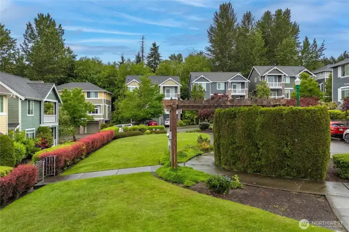 Community park located right in front of the home, offering a beautifully maintained green space and a welcoming neighborhood setting. Community park located right in front of the home, offering a beautifully maintained green space and a welcoming neighborhood setting.