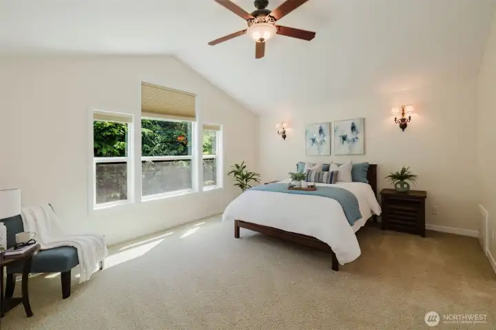 Primary bedroom with Cathedral ceilings Primary bedroom with Cathedral ceilings