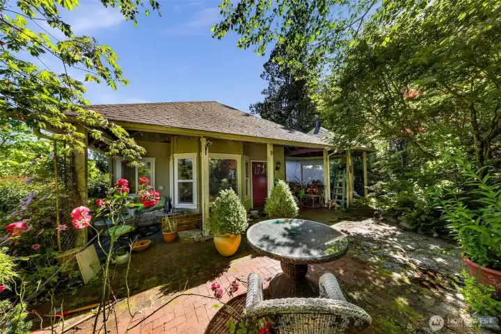 Covered entry off an inviting patio
