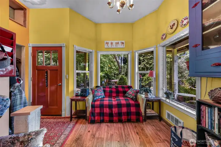 A sitting area off the kitchen with a view of the Cascade foothills.