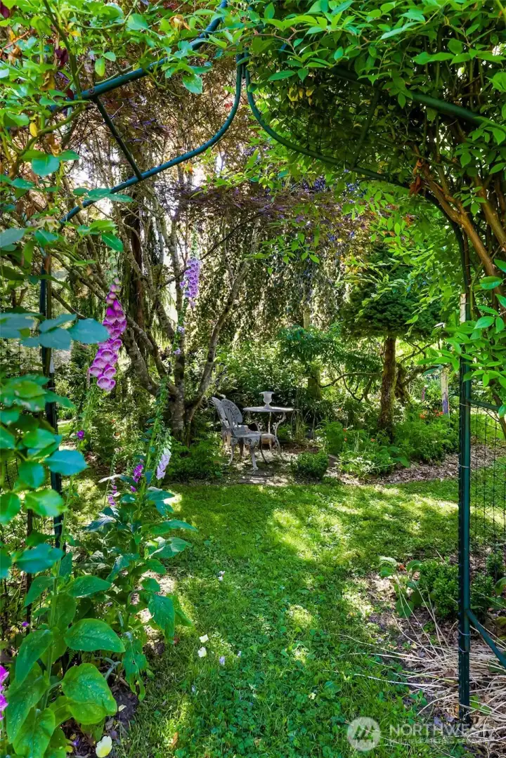 One entrance to the Four-Square Garden.  Each side of the square is a different color combination of established native and cultivated plants.