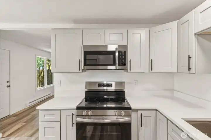 Unit 362 Kitchen with new cabinets and quartz counter tops and stainless steel appliances