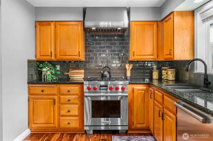 Beautiful Custom Kitchen with Hardwood Floors and Upgraded Wolf Range