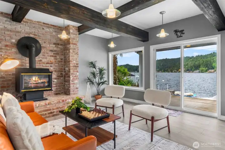 Wood Wrapped Beams and High Ceilings Throughout the Fully Finished Daylight Basement