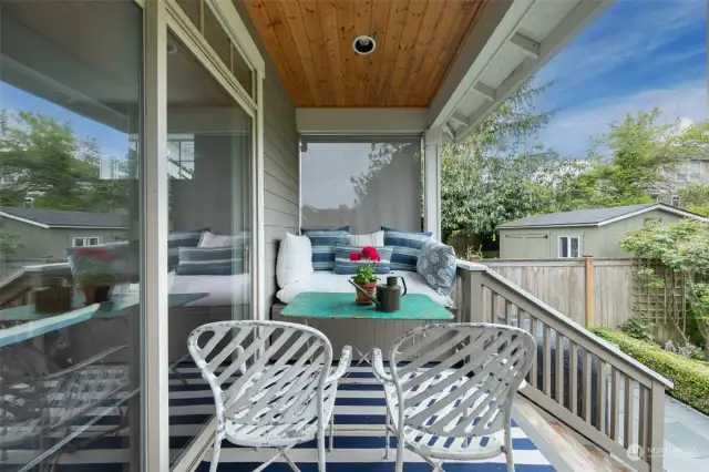 The covered deck allows for entertaining and dining all year long, accessed from French door from the dining area.
