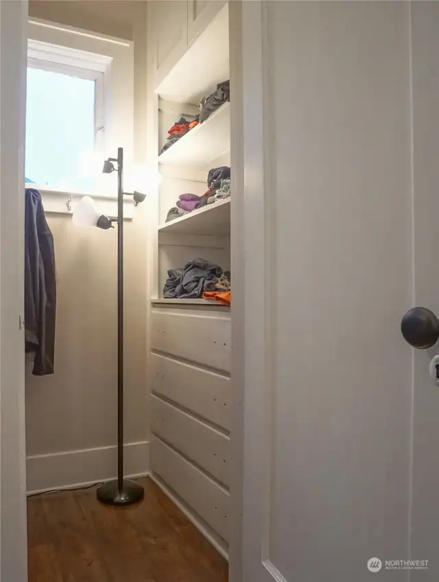 Middle - master bedroom walk in closet