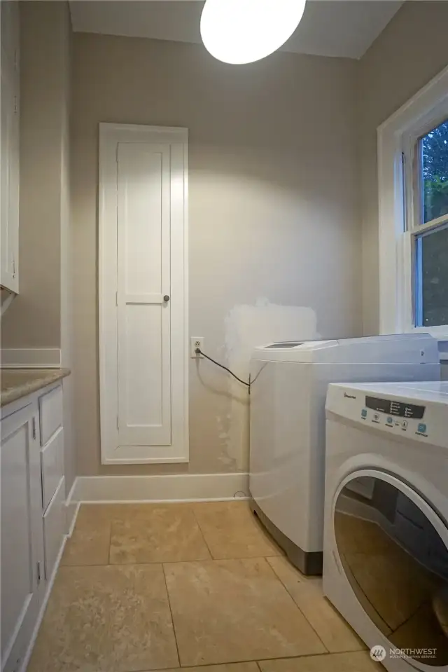 Middle -  storage / pantry in washer & dryer room.