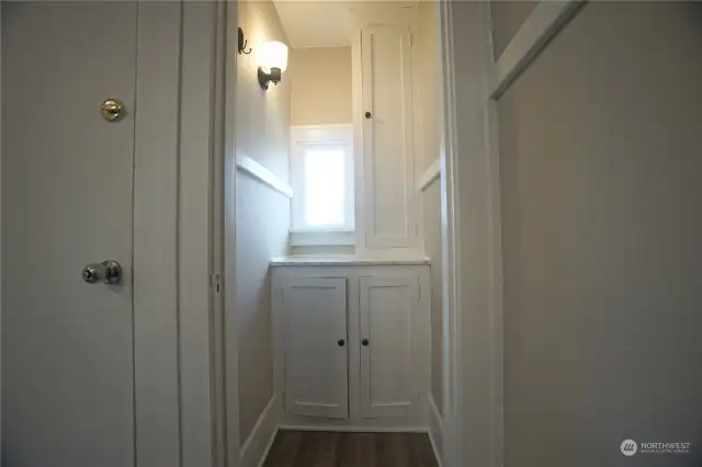 Top - Storage / pantry next to the kitchen.