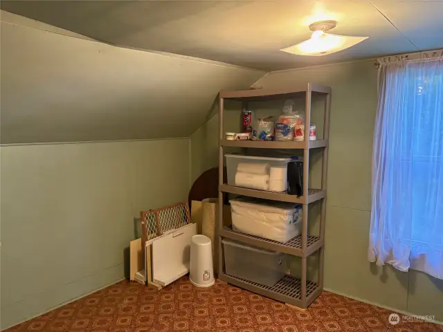 Bedroom 4 or additional storage area.