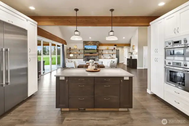 A great expansive view from kitchen looking out towards living and dining areas.