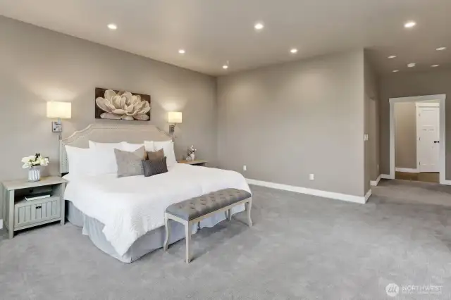 Another angle of the primary ensuite reflects how large this room really is. Behind the wall in the distance is the large walk-in closet.